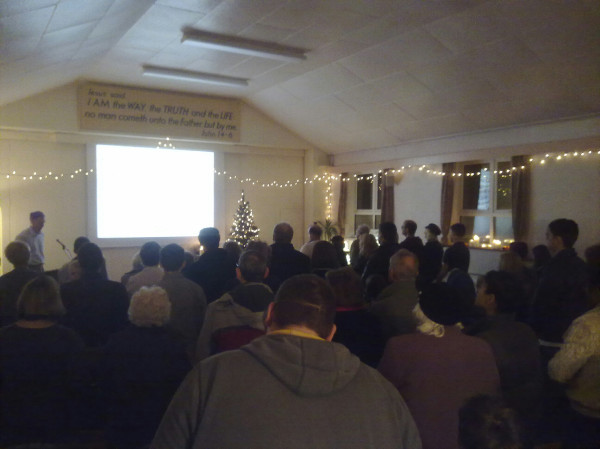 A few of the crowd at last year's Carols by Candlelight service